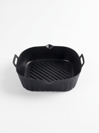 Black rectangular grill pan on a white background