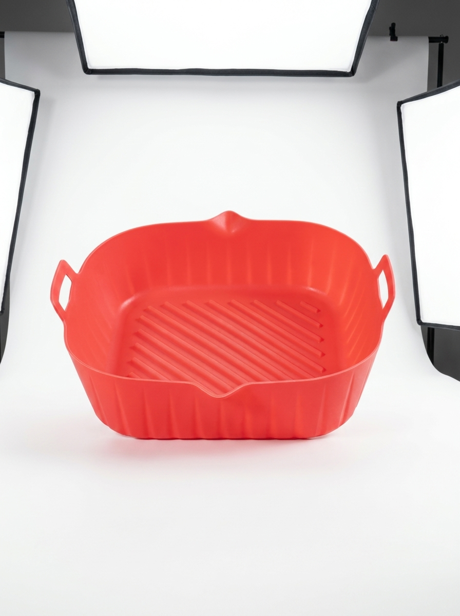 Red square dish with handles on a white background