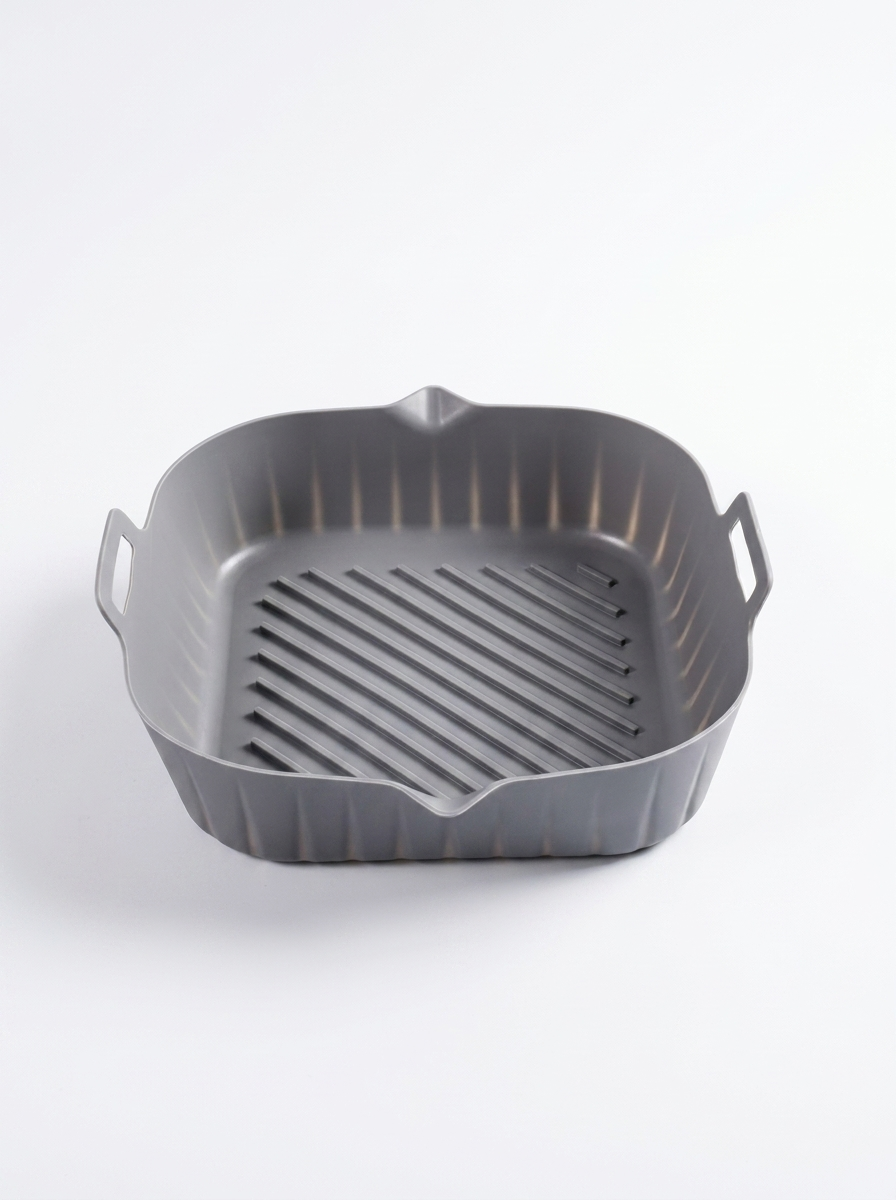 Gray grill pan with handles on a white background